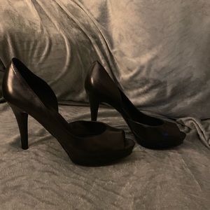 Black leather peep toe pump